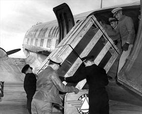 Loading crate into Douglas DC-47