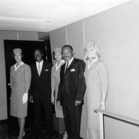 Dr. Martin Luther King, Jr. flies Delta, 1965. Shown in jetway at New York-JFK.