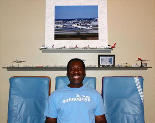 Sly Pittman in his airplane room at home