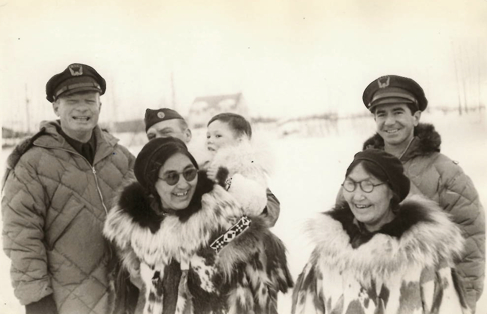Photograph of pilots and Alaskan people