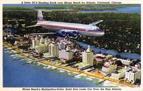 Delta postcard, DC-6 flying over Miami Beach, 1948